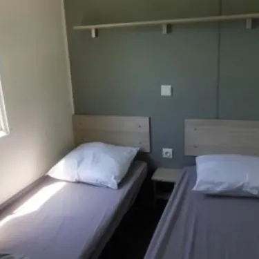 Camping Trigano EVO 24 - La Durance : chambre avec deux lits simples