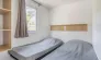 Chambre double avec lits superposés dans MH Confort+ 2CH – 4P - Camping Paradis Domaine de Gaujac