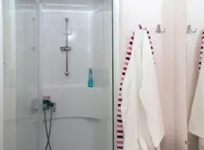 25057