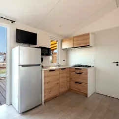 MH Confort + 3CH – 6P - Camping Paradis Les Jonquilles, cuisine équipée