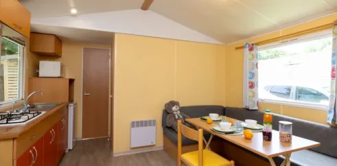 Mobil Home Classique 2 Chambres 4 personnes - Camping Paradis L'Europe, salle à manger et cuisine