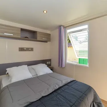 Chambre du Mobil Home Hibiscus 2 Chambres 4/6 Personnes - Nai'a Village - Camping Paradis