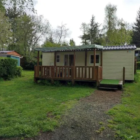 Mobil home Jacinthe avec balcon et jardin devant La Vallée