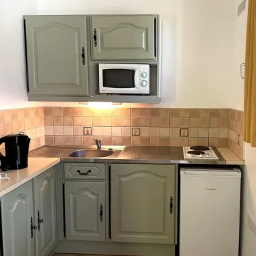 Cottage Evasion 2 Chambres - 4 Pers. - Cuisine avec placards et micro-ondes