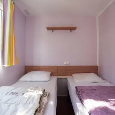 Chambre du Mobil Home Confort Tuffault 2 Chambres 4/6 Personnes - Camping Paradis Les Nobis d'Anjou