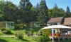Camping Le Balcon de Chartreuse : vue des mobil-homes et terrasse