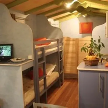 Roulotte 1 Chambre 2 Adultes et 2 Enfants Sans Sanitaires - Paradis Family des Issoux : lits superposés