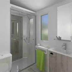 Salle de bain moderne Mobil Home Premium - Camping La Touesse, douche et lavabo