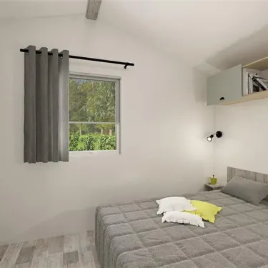 Chambre Mobil Home Premium - Camping La Touesse, lit et rideau gris