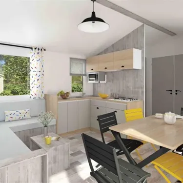 Intérieur Mobil Home Premium 3 Chambres 6 Personnes- Camping La Touesse avec cuisine et salle à manger