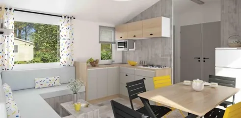 Intérieur Mobil Home Premium 3 Chambres 6 Personnes- Camping La Touesse avec cuisine et salle à manger