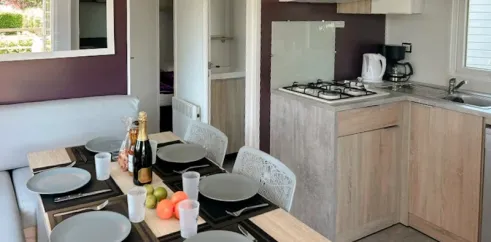 Mobil Home Equilibre 3 Chambres 6 Personnes - Camping Paradis L'Arada Parc, salle à manger et cuisine