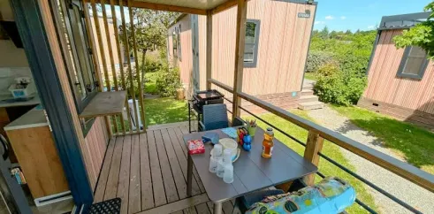Terrasse du cottage Cottage Evasion 3 Chambres 6 Personnes - Camping Paradis L'Arada Parc