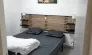 Gîte 2 Chambres 4 Personnes - Camping Fontaine du Roc : chambre avec lit double