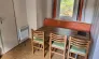 Table à manger avec chaises et banc dans le Cottage Riviera 3 Chambres 6 Personnes - Camping des Bastides