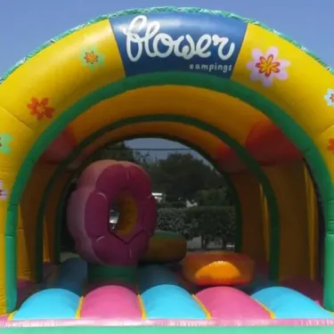 Arc gonflable Flower Campings avec donuts colorés