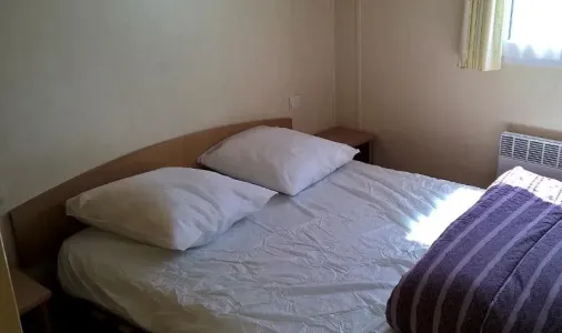 9957